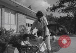 Image of African American suburban mother with children Atlanta Georgia USA, 1960, second 36 stock footage video 65675079731