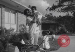 Image of African American suburban mother with children Atlanta Georgia USA, 1960, second 42 stock footage video 65675079731