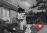 Image of African American suburban mother with children Atlanta Georgia USA, 1960, second 45 stock footage video 65675079731