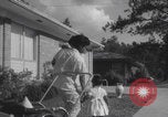 Image of African American suburban mother with children Atlanta Georgia USA, 1960, second 48 stock footage video 65675079731