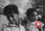 Image of African American suburban mother with children Atlanta Georgia USA, 1960, second 51 stock footage video 65675079731