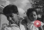 Image of African American suburban mother with children Atlanta Georgia USA, 1960, second 52 stock footage video 65675079731