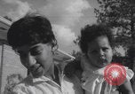 Image of African American suburban mother with children Atlanta Georgia USA, 1960, second 53 stock footage video 65675079731