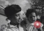 Image of African American suburban mother with children Atlanta Georgia USA, 1960, second 54 stock footage video 65675079731