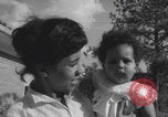 Image of African American suburban mother with children Atlanta Georgia USA, 1960, second 55 stock footage video 65675079731
