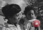 Image of African American suburban mother with children Atlanta Georgia USA, 1960, second 56 stock footage video 65675079731