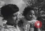 Image of African American suburban mother with children Atlanta Georgia USA, 1960, second 57 stock footage video 65675079731