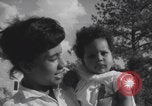 Image of African American suburban mother with children Atlanta Georgia USA, 1960, second 58 stock footage video 65675079731