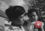 Image of African American suburban mother with children Atlanta Georgia USA, 1960, second 60 stock footage video 65675079731
