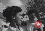 Image of African American suburban mother with children Atlanta Georgia USA, 1960, second 61 stock footage video 65675079731
