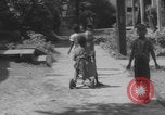 Image of African American children playing in Atlanta Atlanta Georgia USA, 1960, second 1 stock footage video 65675079735