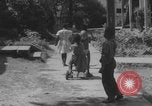 Image of African American children playing in Atlanta Atlanta Georgia USA, 1960, second 4 stock footage video 65675079735