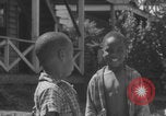Image of African American children playing in Atlanta Atlanta Georgia USA, 1960, second 20 stock footage video 65675079735
