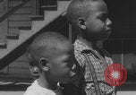 Image of African American children playing in Atlanta Atlanta Georgia USA, 1960, second 34 stock footage video 65675079735