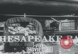 Image of Tangier Island airdrop 1936 Chesapeake Bay Maryland USA, 1936, second 1 stock footage video 65675079796