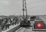 Image of  military equipment unloaded Iran Iran, 1960, second 11 stock footage video 65675079806