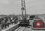 Image of  military equipment unloaded Iran Iran, 1960, second 13 stock footage video 65675079806