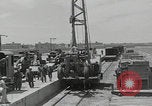 Image of  military equipment unloaded Iran Iran, 1960, second 18 stock footage video 65675079806