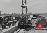 Image of  military equipment unloaded Iran Iran, 1960, second 19 stock footage video 65675079806