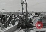 Image of  military equipment unloaded Iran Iran, 1960, second 23 stock footage video 65675079806