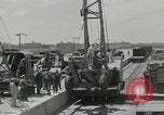 Image of  military equipment unloaded Iran Iran, 1960, second 24 stock footage video 65675079806
