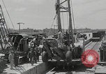 Image of  military equipment unloaded Iran Iran, 1960, second 26 stock footage video 65675079806