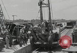 Image of  military equipment unloaded Iran Iran, 1960, second 27 stock footage video 65675079806