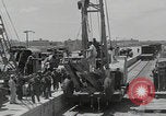 Image of  military equipment unloaded Iran Iran, 1960, second 28 stock footage video 65675079806