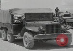 Image of  military equipment unloaded Iran Iran, 1960, second 31 stock footage video 65675079806