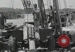 Image of  military equipment unloaded Iran Iran, 1960, second 55 stock footage video 65675079806