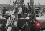 Image of  military equipment unloaded Iran Iran, 1960, second 57 stock footage video 65675079806