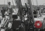 Image of  military equipment unloaded Iran Iran, 1960, second 58 stock footage video 65675079806