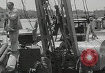 Image of  military equipment unloaded Iran Iran, 1960, second 59 stock footage video 65675079806