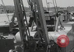 Image of  military equipment unloaded Iran Iran, 1960, second 61 stock footage video 65675079806