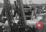 Image of  military equipment unloaded Iran Iran, 1960, second 62 stock footage video 65675079806