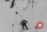 Image of slalom skiing Switzerland, 1960, second 19 stock footage video 65675079821