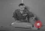 Image of bomb preparation United States USA, 1941, second 12 stock footage video 65675079826