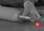 Image of WWII fragmentation bomb assembly United States USA, 1941, second 50 stock footage video 65675079828
