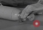 Image of WWII fragmentation bomb assembly United States USA, 1941, second 60 stock footage video 65675079828
