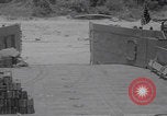 Image of bomb disposal Okinawa Japan, 1953, second 44 stock footage video 65675079842
