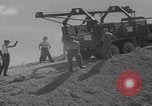 Image of ordnance disposal detonation Okinawa Japan, 1953, second 8 stock footage video 65675079844