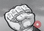 Image of Communist fist cartoon United States USA, 1956, second 16 stock footage video 65675079897