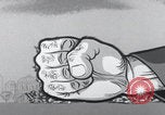 Image of Communist fist cartoon United States USA, 1956, second 24 stock footage video 65675079897