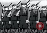 Image of Cold War propaganda cartoon Communists United States USA, 1956, second 18 stock footage video 65675079899