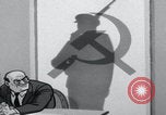 Image of Cold War propaganda cartoon Communists United States USA, 1956, second 29 stock footage video 65675079899
