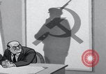 Image of Cold War propaganda cartoon Communists United States USA, 1956, second 30 stock footage video 65675079899