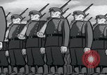Image of Cold War propaganda cartoon Communists United States USA, 1956, second 57 stock footage video 65675079899