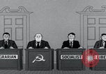 Image of Cold War cartoon communist conspires United States USA, 1956, second 37 stock footage video 65675079902