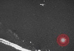 Image of Japanese planes and ships strafed in Leyte WWII Philippines, 1944, second 8 stock footage video 65675079909