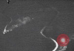Image of Japanese planes and ships strafed in Leyte WWII Philippines, 1944, second 12 stock footage video 65675079909